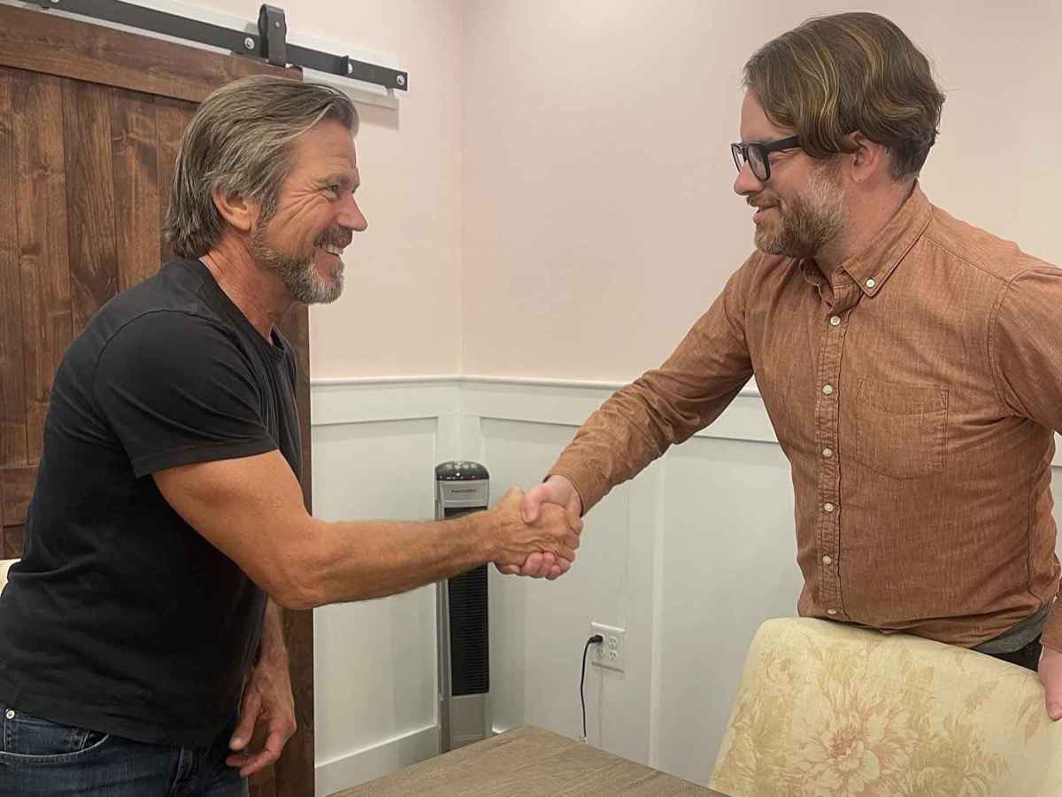 Alex Reynolds and Curt Niemela at the deed signing