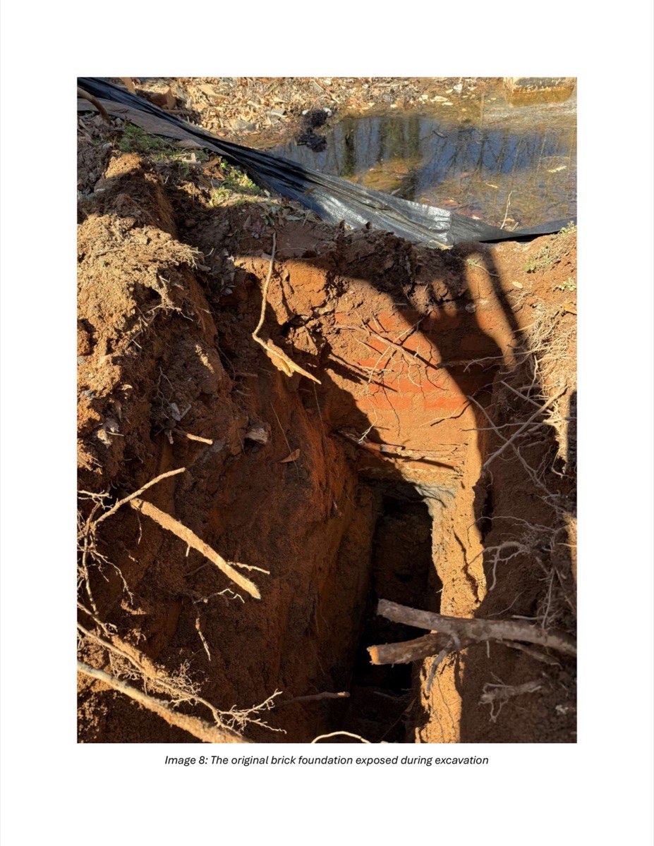 The original octagonal brick foundation of the Chick Springs springhouse exposed after Hurricane Helene, 2024